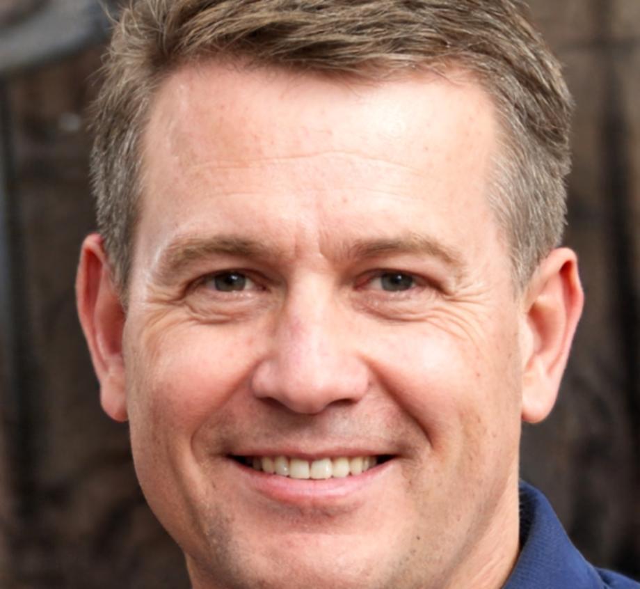Professional headshot of Darren Mitchell, Finance Manager