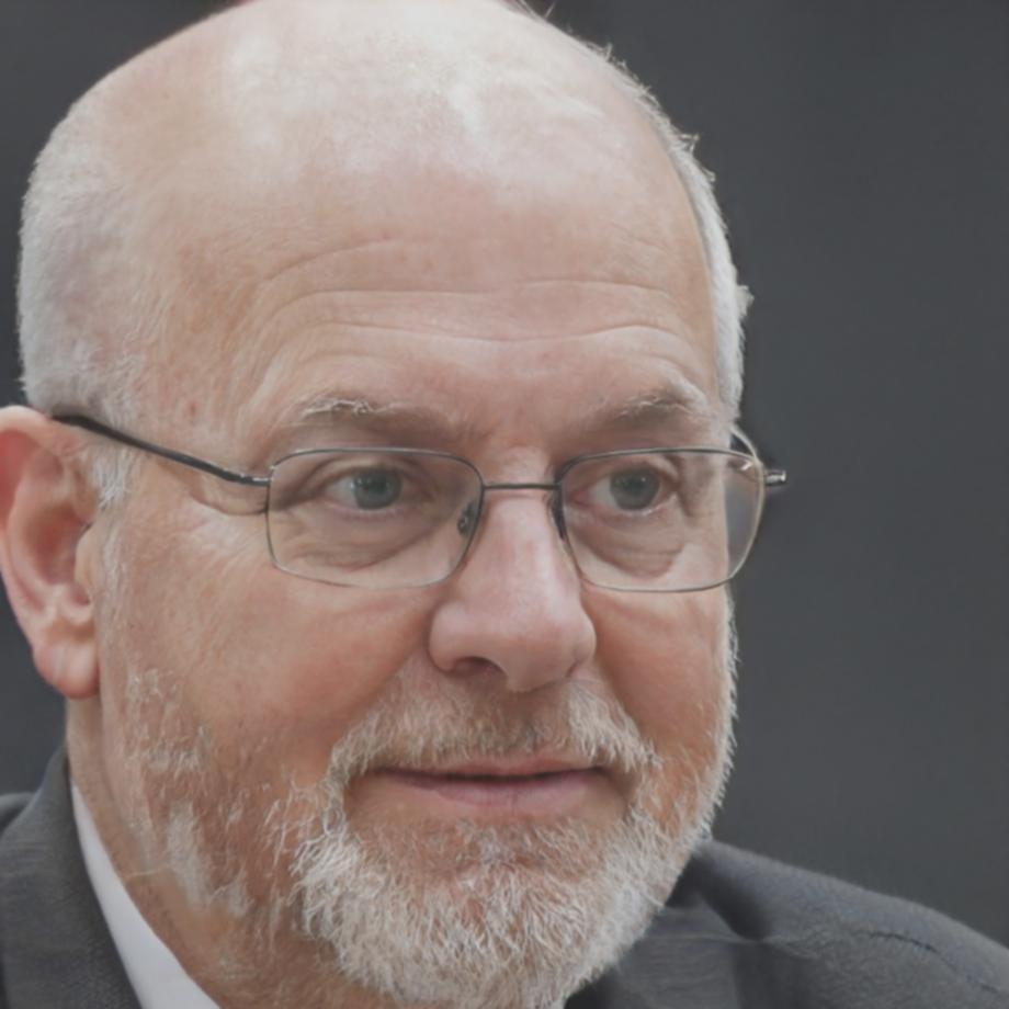Professional headshot of risk assessment expert
